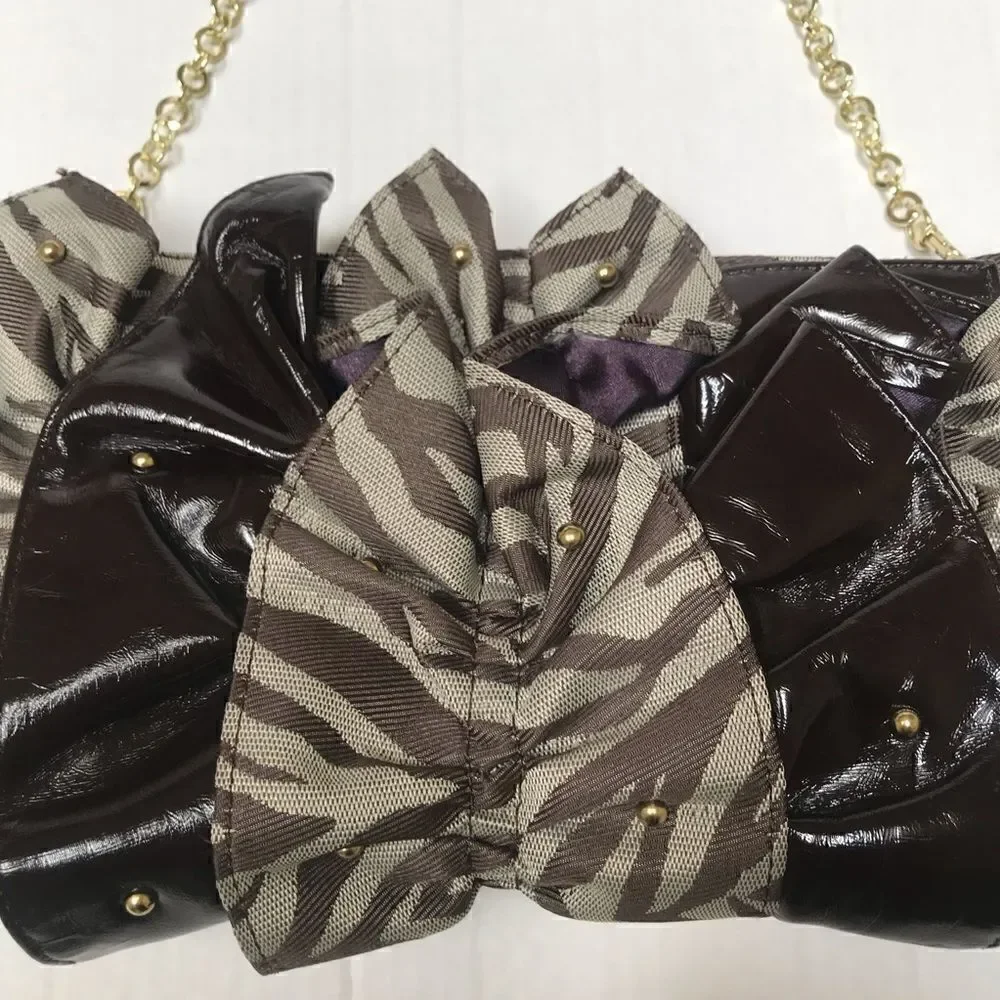 ‎Vintage Y2K Rampage zebra striped clutch chain strap detail purse